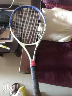 White And Blue Tennis Racket