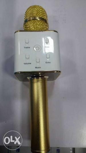 White And Gold-colored Microphone