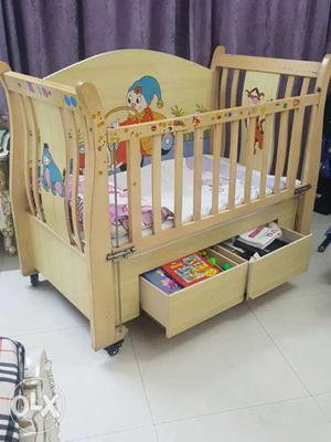 Baby's Brown Wooden Storage Crib