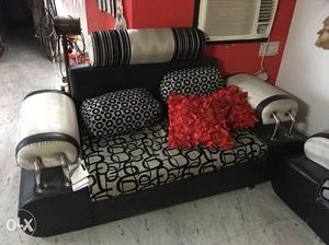 Beige And Black Fabric Padded Sofa