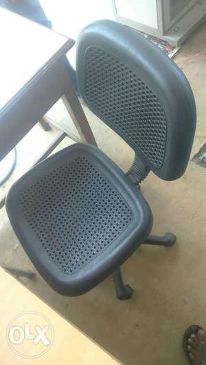 Black Plastic Rolling Armless Chair