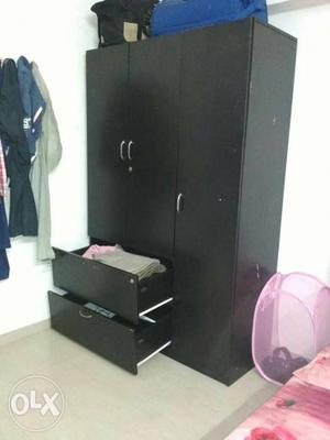 Black Wooden wardrobe with queen size bed.(Without mattress)