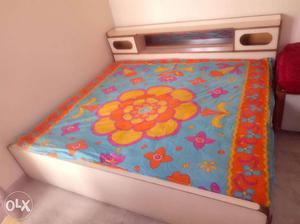 Blue, Orange, And Yellow Floral Bed Sheet