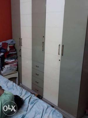 Gray And White Wooden Wardrobe