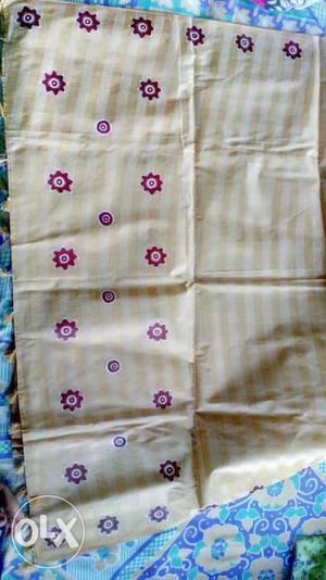 Mekhela Chador. hand fabric in red and white done