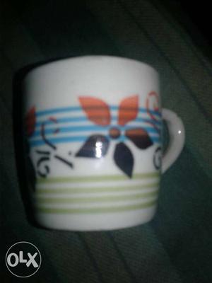 My one hand using lucky tea cup