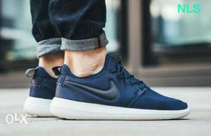 Pair Of Blue And White Nike Low Tops
