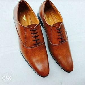 Pair Of Brown Leather Dress Shoes