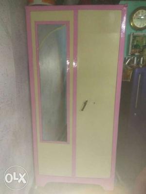 Pink And Beige Wooden Cabinet