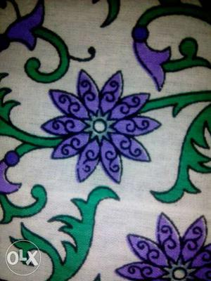 Purple, Green, And White Floral Textile