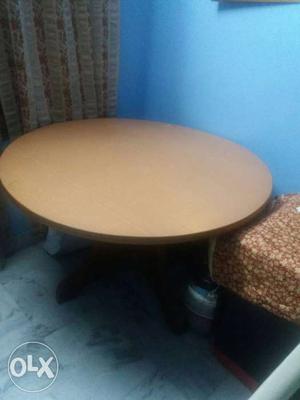 Round wooden dining table in good condition just