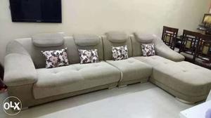 Tufted Gray Sectional Sofa With Throw Pillows