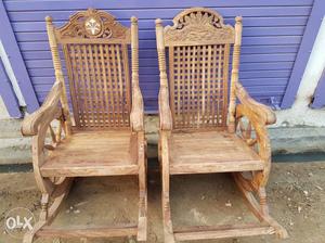 Two Brown Wooden Rocking Armchairs