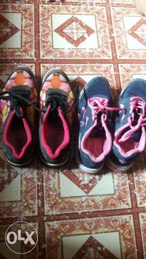 Two Pairs Black And Pink Sneakers