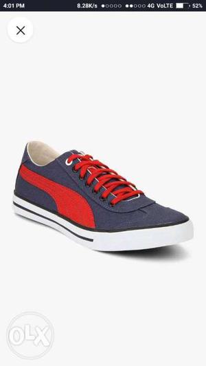 Unpaired Blue And Red Puma Low-top Sneakers Screenshot