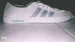 Unpaired White And Black Adidas Low-top Sneaker