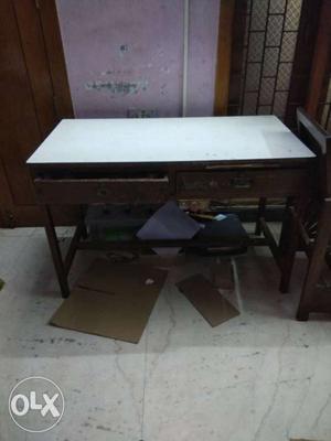 White And Brown Wooden 2-drawer Desk with sliding pad.