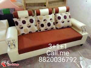 White And Orange Fabric Sofa