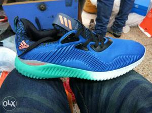 White, Blue And Green Adidas Shoe