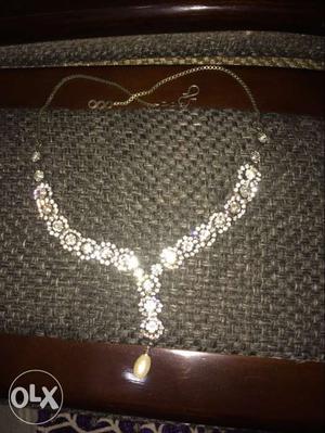 White stone necklace one time used