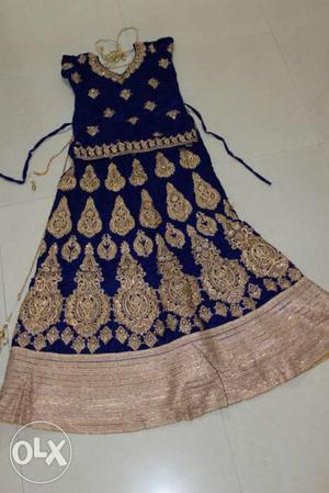 Women's Blue And Golden Lahanga With Pink Dupatta