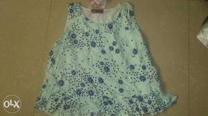 Women's White And Blue Floral Sleeveless Shirt