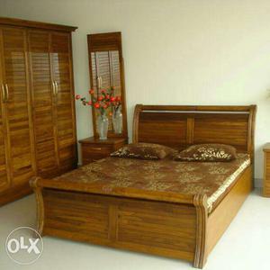 100% royal wooden bed with storage. brand new bed