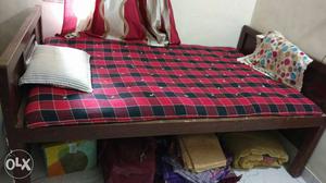 4*6 Brown Wooden Bed With Red And Black Checkered Mattress