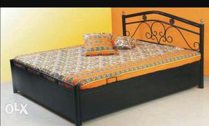 5*6 wought iron bed with storage..as it is condition without