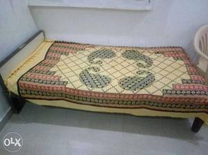 A good condition single bed.