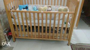 Baby's Beige Wooden Crib