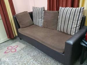 Black And Brown Sofa With Throw Pillows