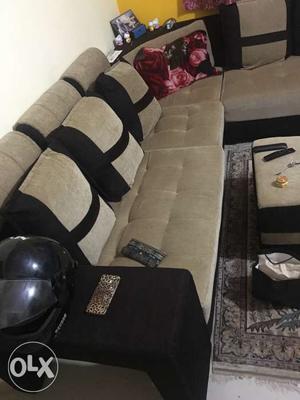 Black And Gray Sectional Couch With Throw Pillows