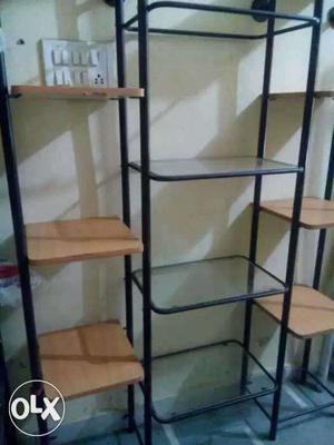 Black Metal Frame And Brown Cubby Shelves