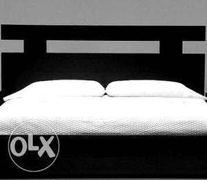 Black Wooden Framed Double Bed..