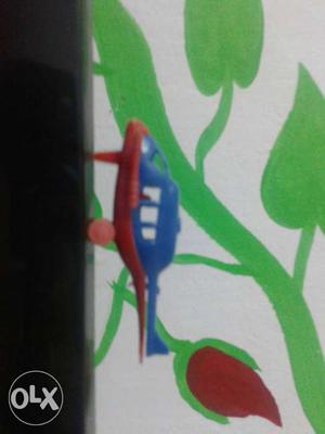 Blue And Red Plastic Helicopter Toy