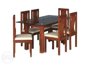Brand new dinning table with 4 chairs. direct