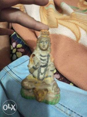 Brown And Green Religious Ceramic Figurine