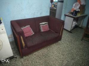 Brown Loveseat With Throw Pillows