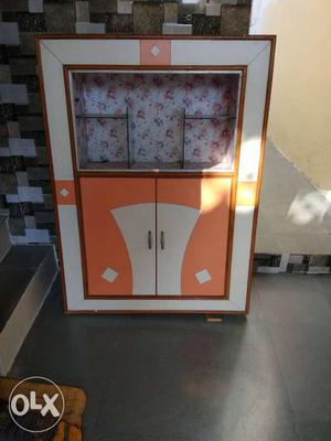 Brown, Orange And White Wooden Cabinet