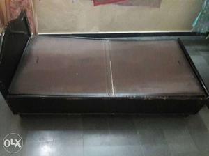 Brown Wooden Bed box type