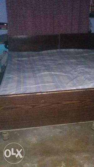 Brown Wooden Double Bed without box...