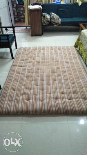 Cotton mattress size 5 by 6.5 ft only one year old. Good