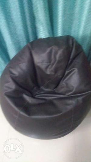 Dark brown used bean bag in good condition
