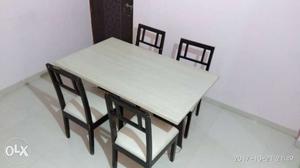 Dining table (detachable) with four chairs. Price is not