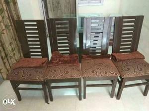 Dinning table with four chairs in good condition.