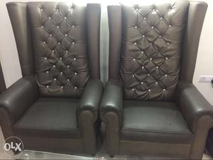 High back chair with a table. Brown color sofa