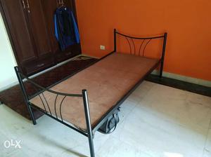 One non folding iron single bed with single mattress
