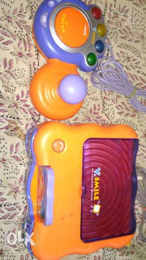 Purple And Orange V Smile Learning Toy