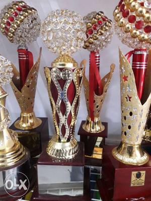 Red And Gold-colored Trophy Collection